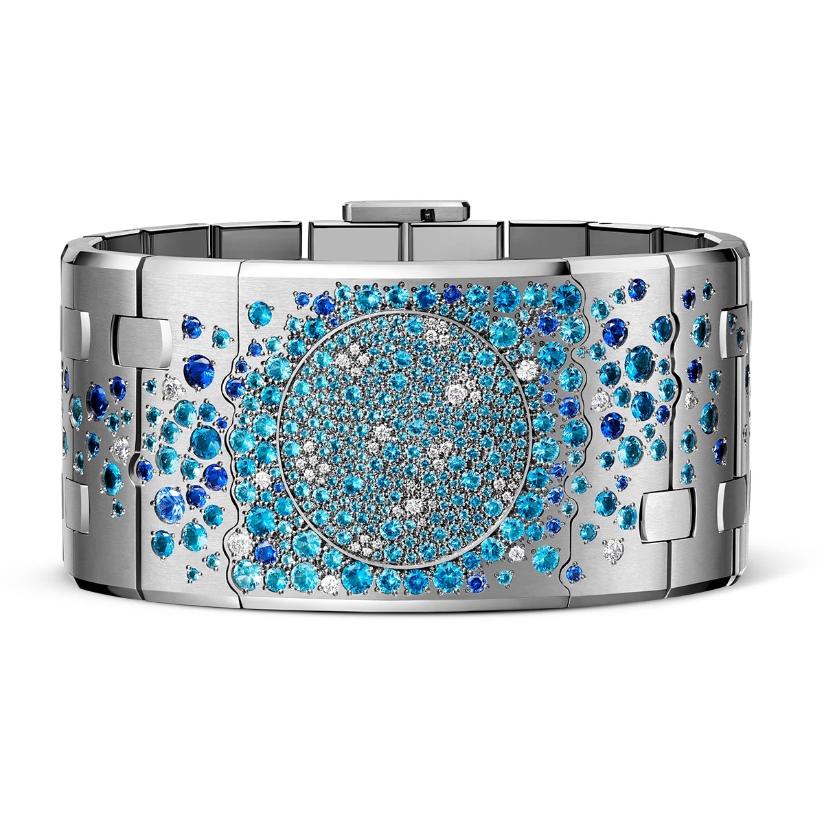 Dream of Joux Blue Moon cuff in white gold with blue stones arranged around its center.