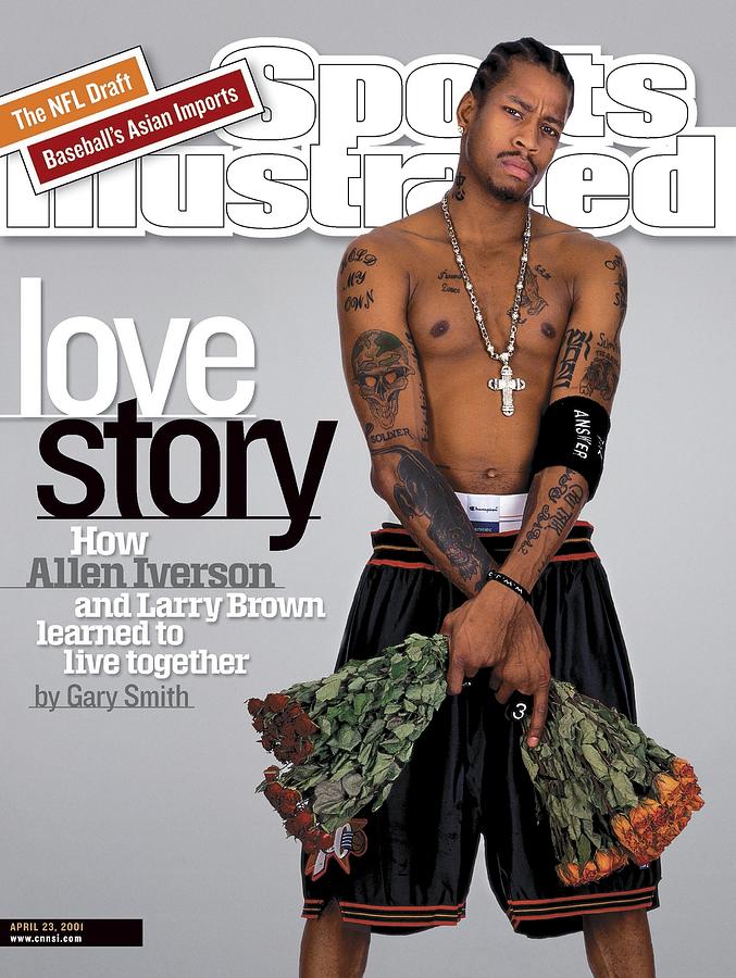 The April 23, 2001 Sports Illustrated cover shows Allen Iverson holding flowers in his 76ers uniform shorts, with his tattoos and cross pendant visible.