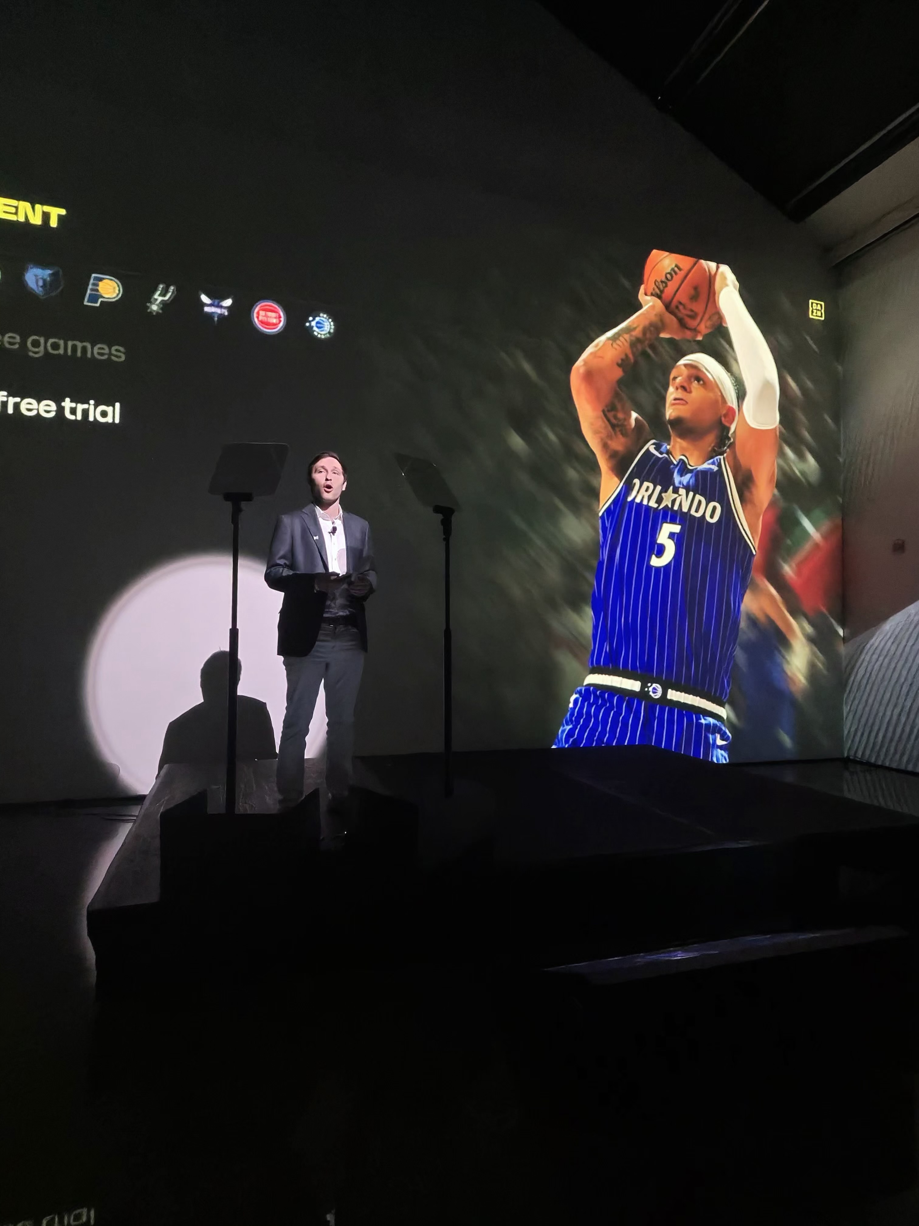 DAZN presentation screen showing Orlando basketball footage