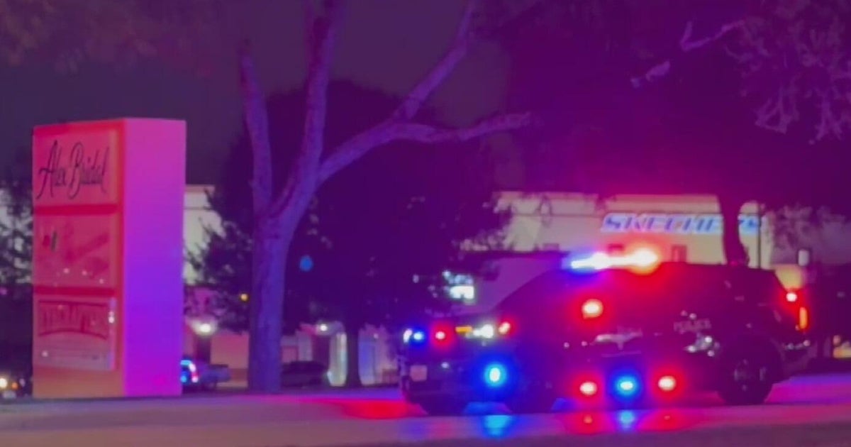 Police vehicles outside La Gran Plaza in Fort Worth in the supplied CBS Texas report image.
