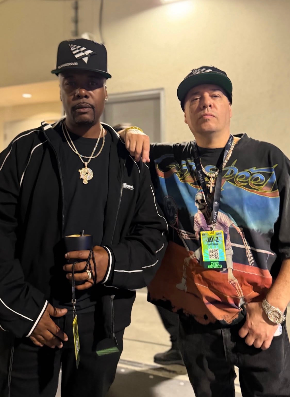 Memphis Bleek, left, wearing a Roc-A-Fella pendant beside Dren Starr.