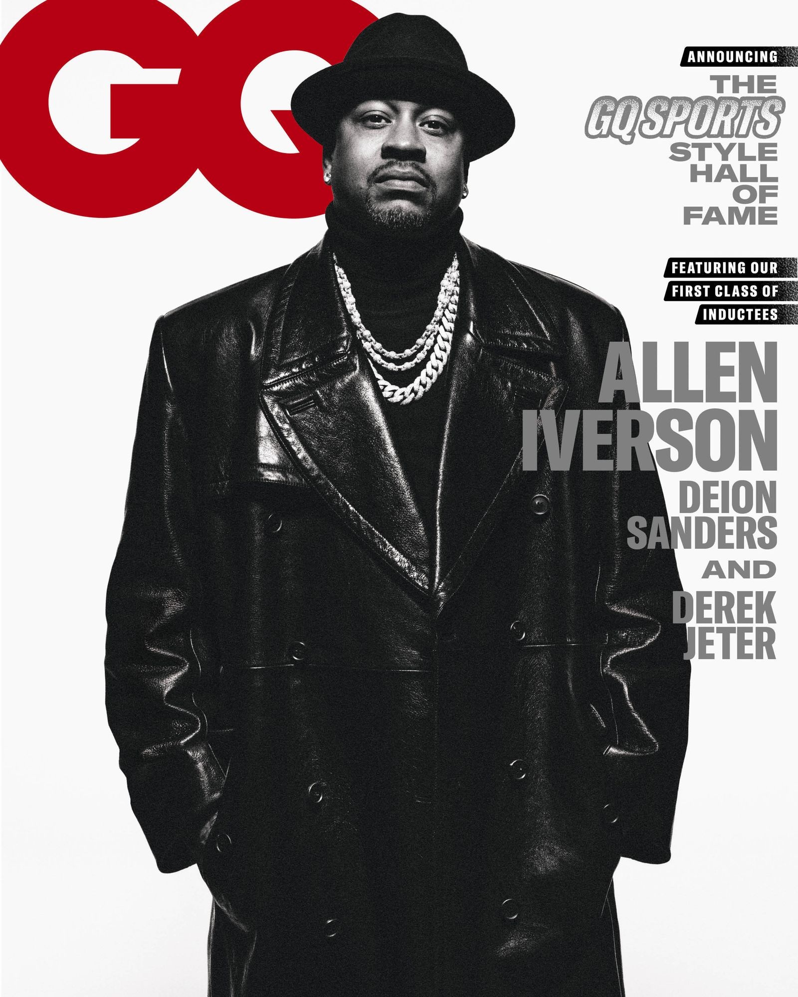 Allen Iverson on the February 2023 GQ cover in a black hat and coat with layered diamond necklaces and earrings.