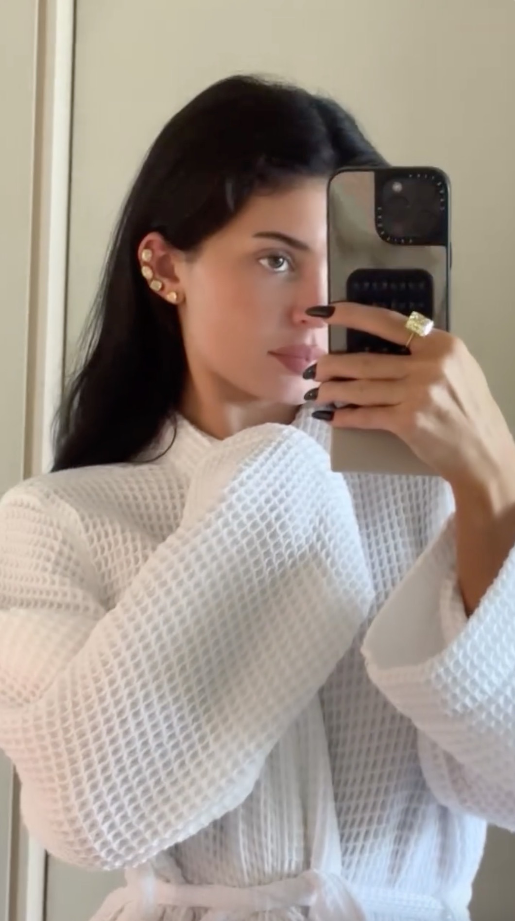 Jenner also wore a matching cushion cut yellow diamond ring. Photo: Kylie Jenner/Instagram.